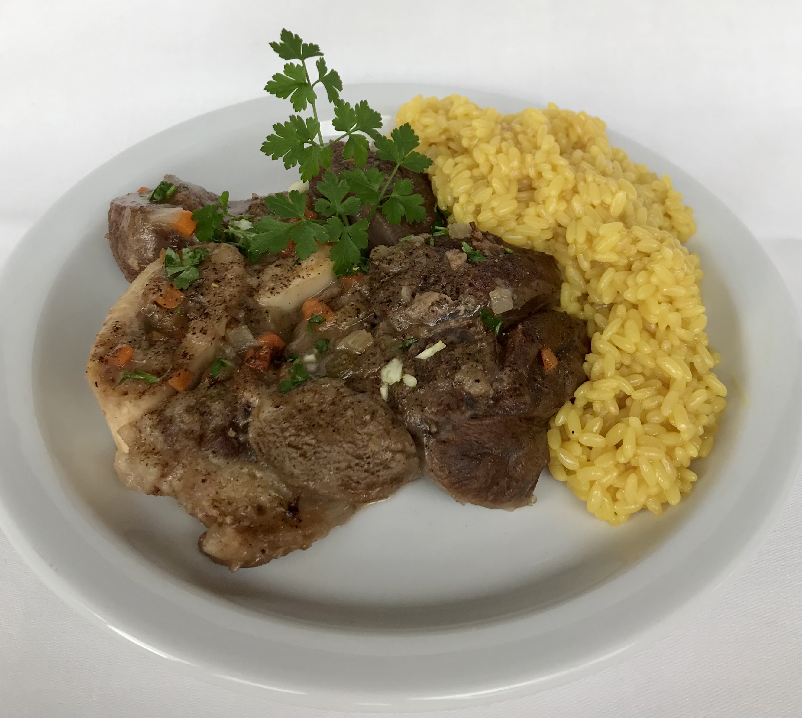 ossobuco in gremolata con risotto allo zafferano